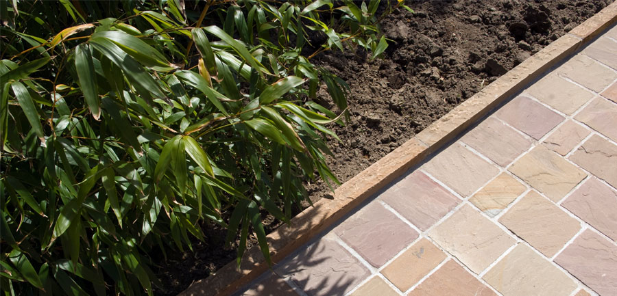 Bordure pierre jardin : styles, pose et délimitation