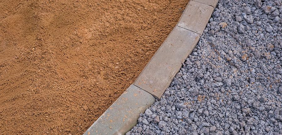 Bordure béton : structurer durablement un jardin, une allée ou une terrasse